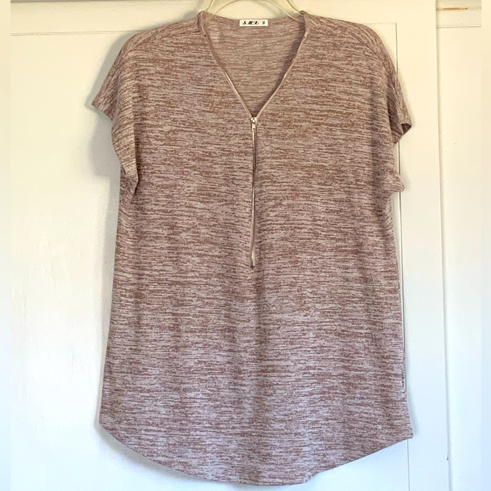 Soft Tee with zipper from collar to mid length.  Short sleeves.  Curved hemline.